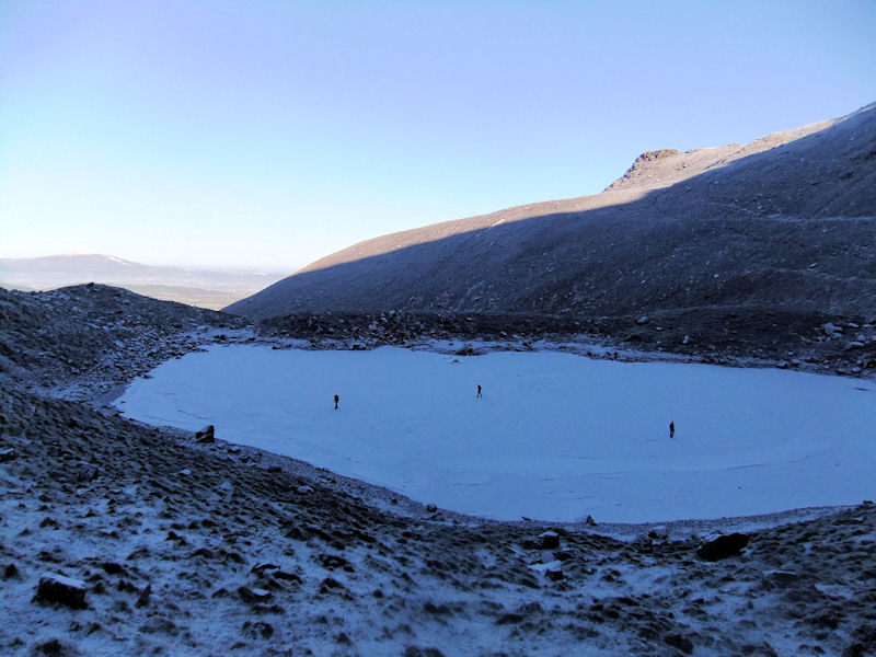 Walking on the frozen Coum Iarthar lakes